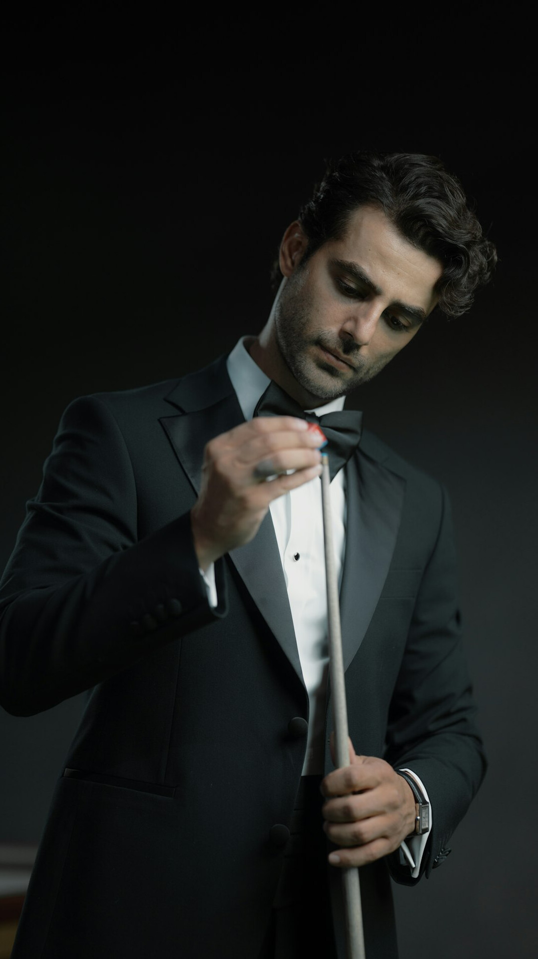 Studio portrait of a professional man coach in a suit