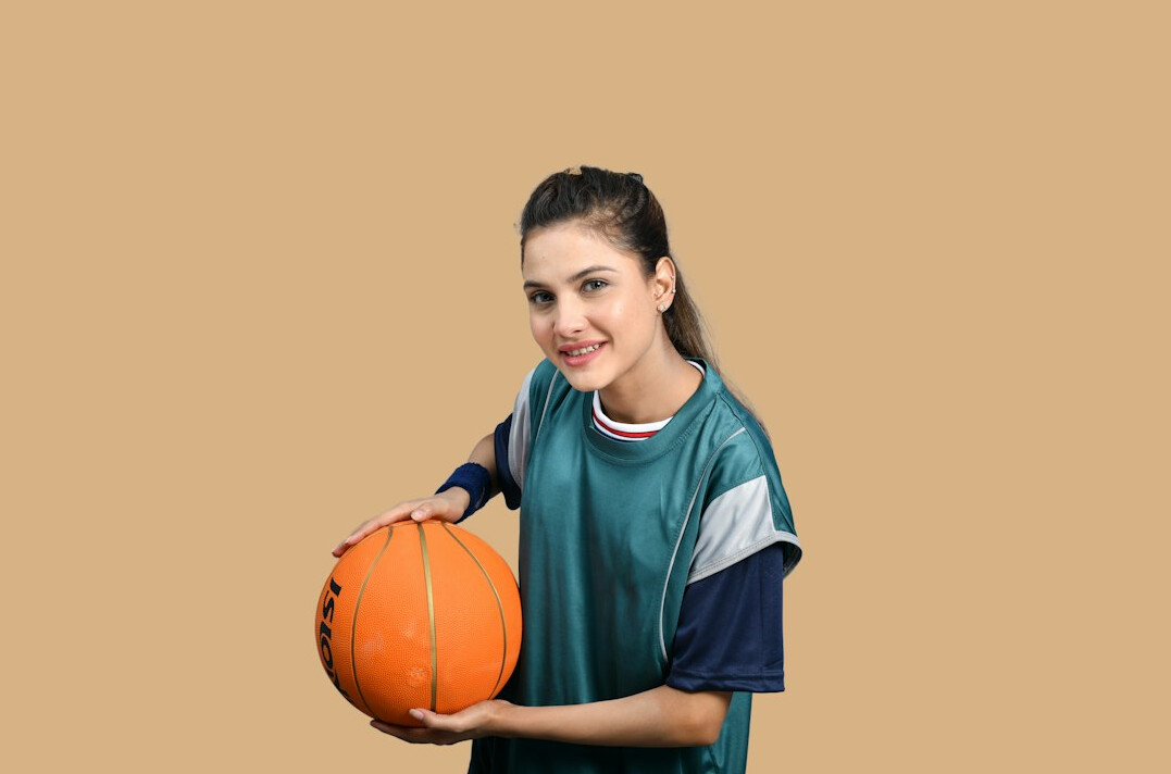Studio portrait of a professional woman coach with confident smile